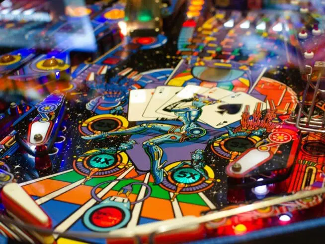 Closeup of a pinball machine.