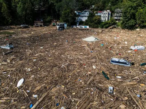 Debris is strewn on the lake in the aftermath of Hurricane Helene, Oct. 2, 2024, in Lake Lure, North Carolina.