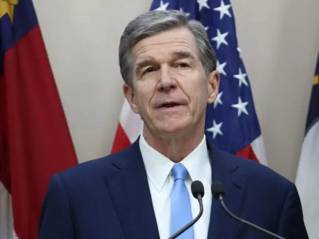 North Carolina Democratic Gov. Roy Cooper holds a news conference in the state Administration Building on Tuesday, Nov. 16, 2021, in Raleigh